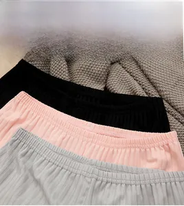 Detail of high-elasticity ribbed fabric and precision stitching on safety shorts