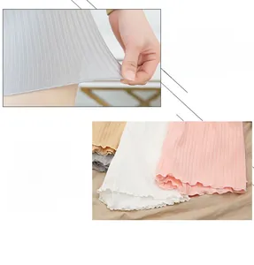 Detailed view of high-elasticity ribbed fabric and wavy bud hem on women's safety shorts