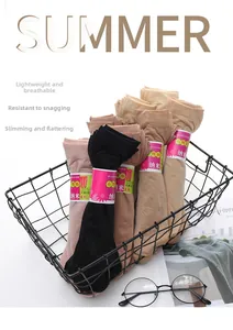 Close-up of velvet ultra-thin sheer socks in black and beige with roll-up packaging
