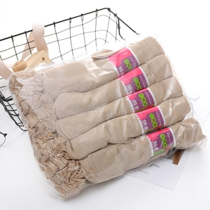 Five pairs of ultra-thin sheer skin-colored socks in packaging for summer wear