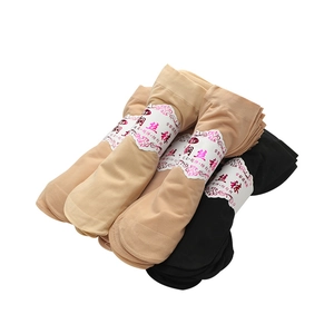 Bundled sheer nylon ankle socks in beige and black with snag-resistant reinforced fabric