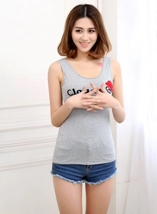 Close-up of cotton racerback tank top featuring flocked Cloud text and heart detail