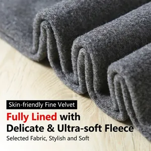Close-up of dark grey thermal leggings with soft fleece lining on wooden background