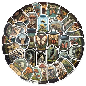 Set of 50 vintage specimen stickers featuring gothic animals and plants in glass jars