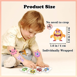 Detailed view of individual cartoon monster temporary tattoos measuring 1.6 x 1.6 inches