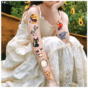 Waterproof cartoon animal temporary tattoos for kids featuring lion and zebra designs