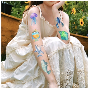 Waterproof sea creature temporary tattoos for kids featuring sharks and tropical fish