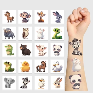 Detail showing 20 colorful cartoon animal temporary tattoos and arm application effect