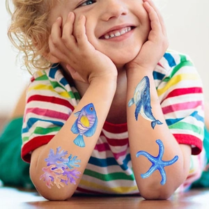Waterproof temporary ocean creature tattoos for kids featuring whales and sea life