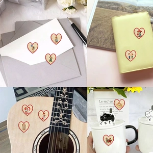 Retro heart stickers on envelopes, journals, guitars and cups for creative decoration