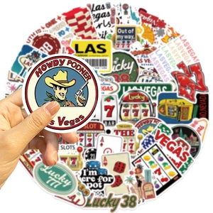 Macro view of Las Vegas themed waterproof stickers featuring casino chips and lucky slots