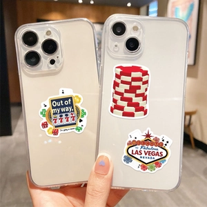 Detail of Las Vegas casino stickers on transparent phone cases with slot machine motifs
