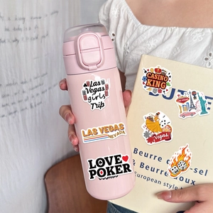 Las Vegas themed waterproof stickers on a pink tumbler and book for DIY decoration