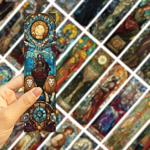 Macro view of stained glass style Chariot tarot bookmark with sun and lion motifs