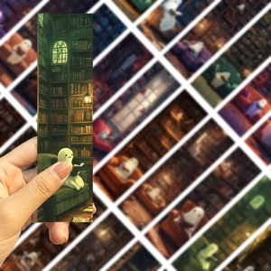 Detail of paper bookmarks showing a cute ghost reading in a vintage library setting
