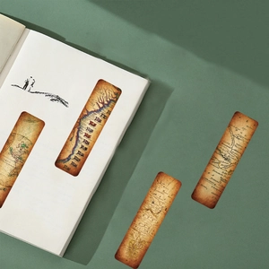 Close-up of vintage kraft paper bookmarks with retro world map patterns and textures