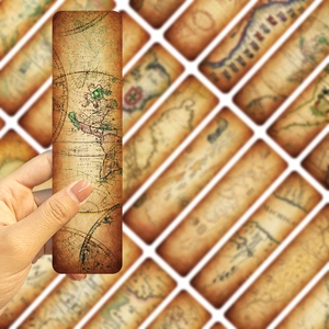 Detail of vintage kraft paper bookmark featuring an antique world map with hand-held view