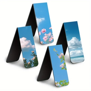 Close-up of four magnetic bookmarks with floral and coastal nature landscape designs