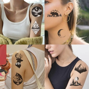 Waterproof temporary tattoos featuring black mountain forest and wild animal designs