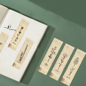 Detail of vintage flower bookmarks with botanical illustrations on aged paper material