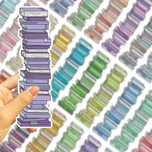 Close-up of creative stack of purple books sticker for journals and scrapbooks