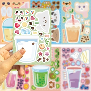 Macro shot of cute cartoon DIY milk tea stickers featuring polar bear and panda designs