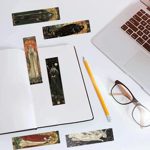 Detailed close-up of vintage wizard bookmarks with tarot-style line art and Roman numerals