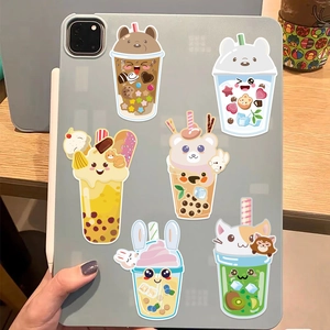 Set of 6 kawaii animal milk tea stickers decorating the back of a grey tablet
