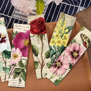 Vintage floral paper bookmarks set featuring roses and butterflies on a cork background