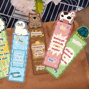 Cute cartoon animal bookmarks in pastel colors arranged on a rustic cork background