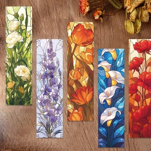 Stained glass floral bookmarks set with colorful tulip and rose patterns on wood