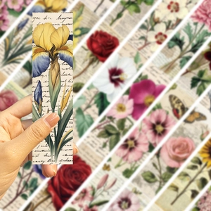 Detail of vintage floral bookmarks with hand-drawn botanical art and retro script