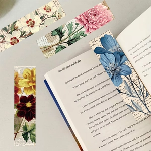 Detailed view of vintage floral bookmarks with handwritten script on premium paper cards