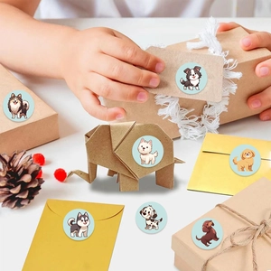 Detail showing cartoon dog stickers applied on kraft gift boxes and envelopes for DIY decor