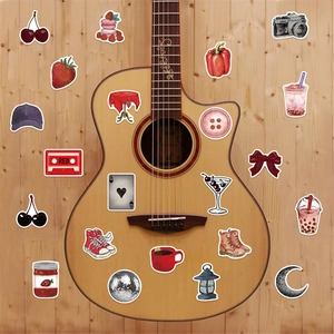 Lot de 100 autocollants graffiti Downtown Girl noir et rouge sur une guitare