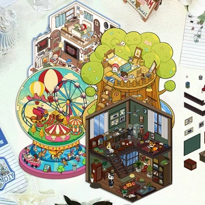 Vue macro de stickers 3D DIY avec scènes de cabane imaginaire et chambre à coucher décorée