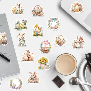50pcs Happy Easter stickers set with watercolor bunny and egg motifs on a white desk