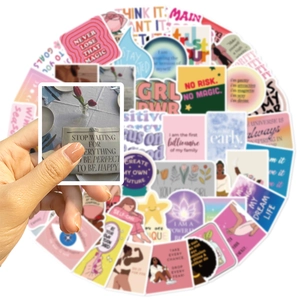 Close-up of inspirational black girl stickers with motivational quotes on macaron colors