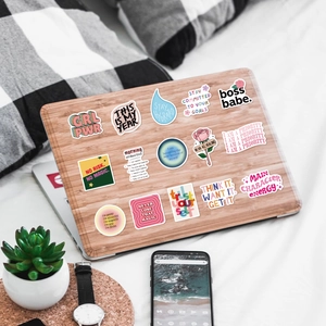 52 Black Girl Inspirational Vision Board stickers on a laptop with decor