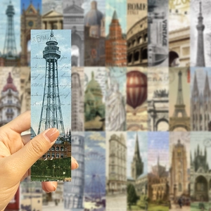Detailed close-up of vintage cardboard bookmarks featuring European architectural illustrations