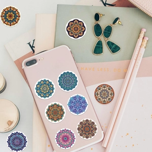 Roll of mandala decorative stickers for journals and crafts with colorful patterns