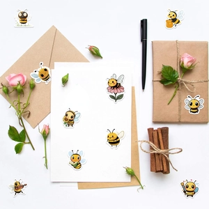 Detailed view of cute cartoon bee stickers decorating kraft envelopes and gift cards