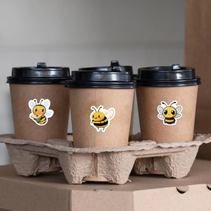 500pcs roll of cartoon bee decorative stickers applied on brown paper coffee cups