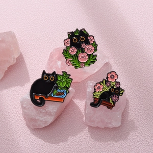 Three cute black cat enamel pins set featuring garden floral designs and zinc alloy finish