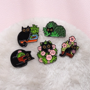 Cartoon black cat enamel pins set featuring plants and fishbowl for bags and clothing