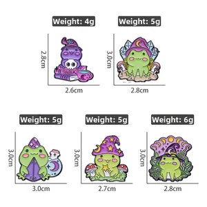 Macro view of five colorful wizard frog enamel pins with magical spell books and potions
