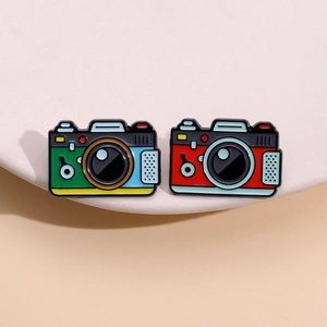Retro camera enamel pin set with vintage green and red photography camera designs
