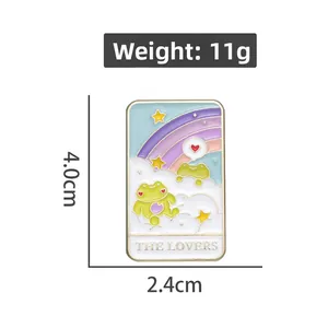 Detail view of The Lovers tarot enamel pin showing frog design and 4.0cm x 2.4cm dimensions