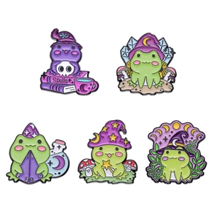 Set of five cute cartoon Halloween wizard frog enamel pins with magical spell accessories