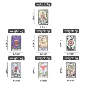 Detail of tarot style enamel pins featuring coffee and pizza motifs in 1.1x0.7 inch size